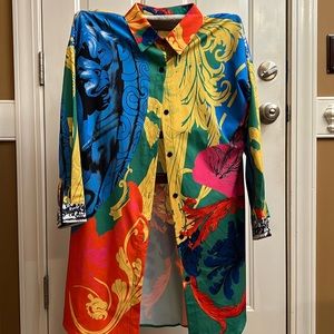 This looks great as a dress or with tights underneath.  Very colorful